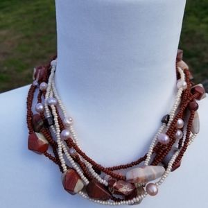 Rust and cream 8 strand beaded necklace